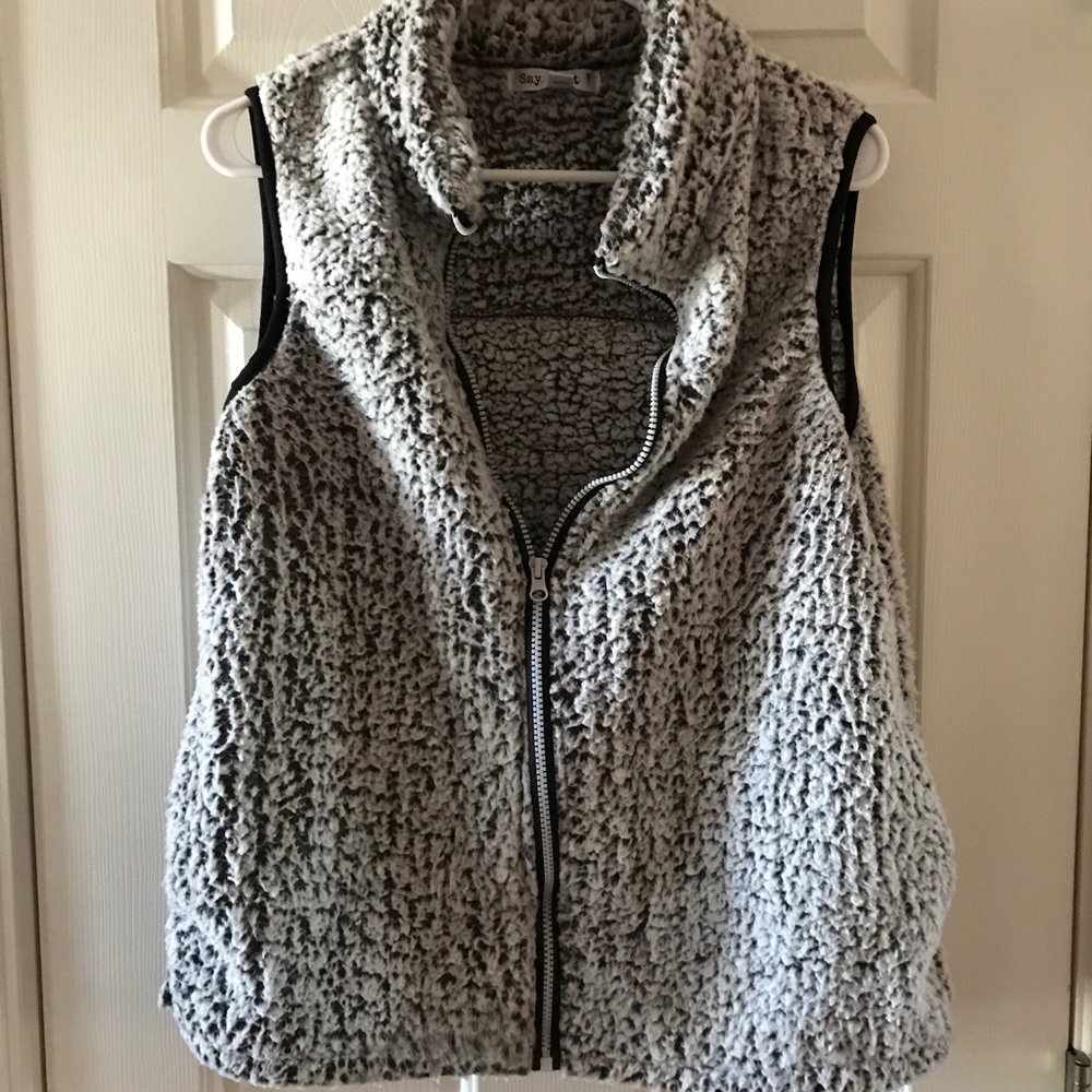 Jr sleeveless zip up vest